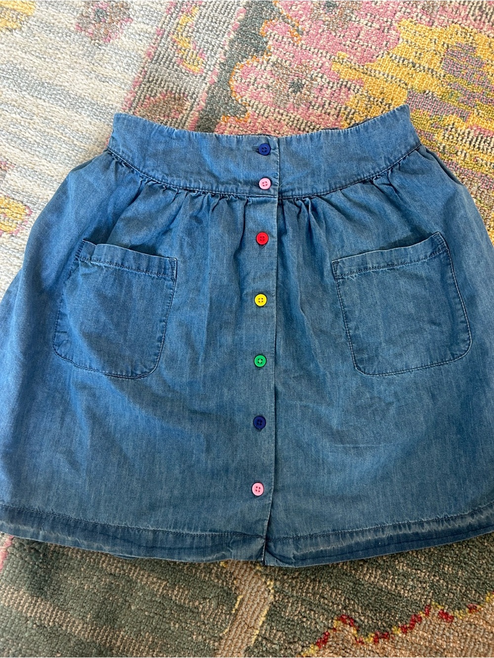 Boden denim twirly skirt with a rainbow button front and patch pockets size 9/10